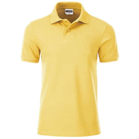 Basic Herren-Poloshirt aus Bio-Baumwolle in Light Yellow von James+Nicholson (Artnum: JN8010